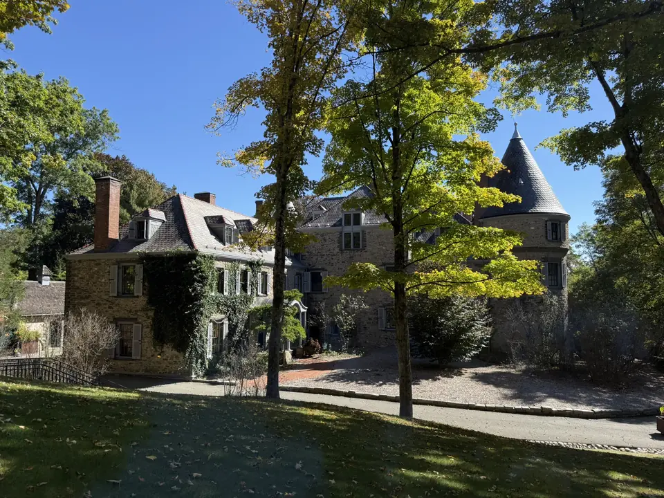Grey Towers National Historic Site in Milford among tall trees